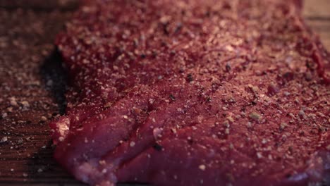 Mixed-pepper-and-spices-on-the-raw-meat-steak